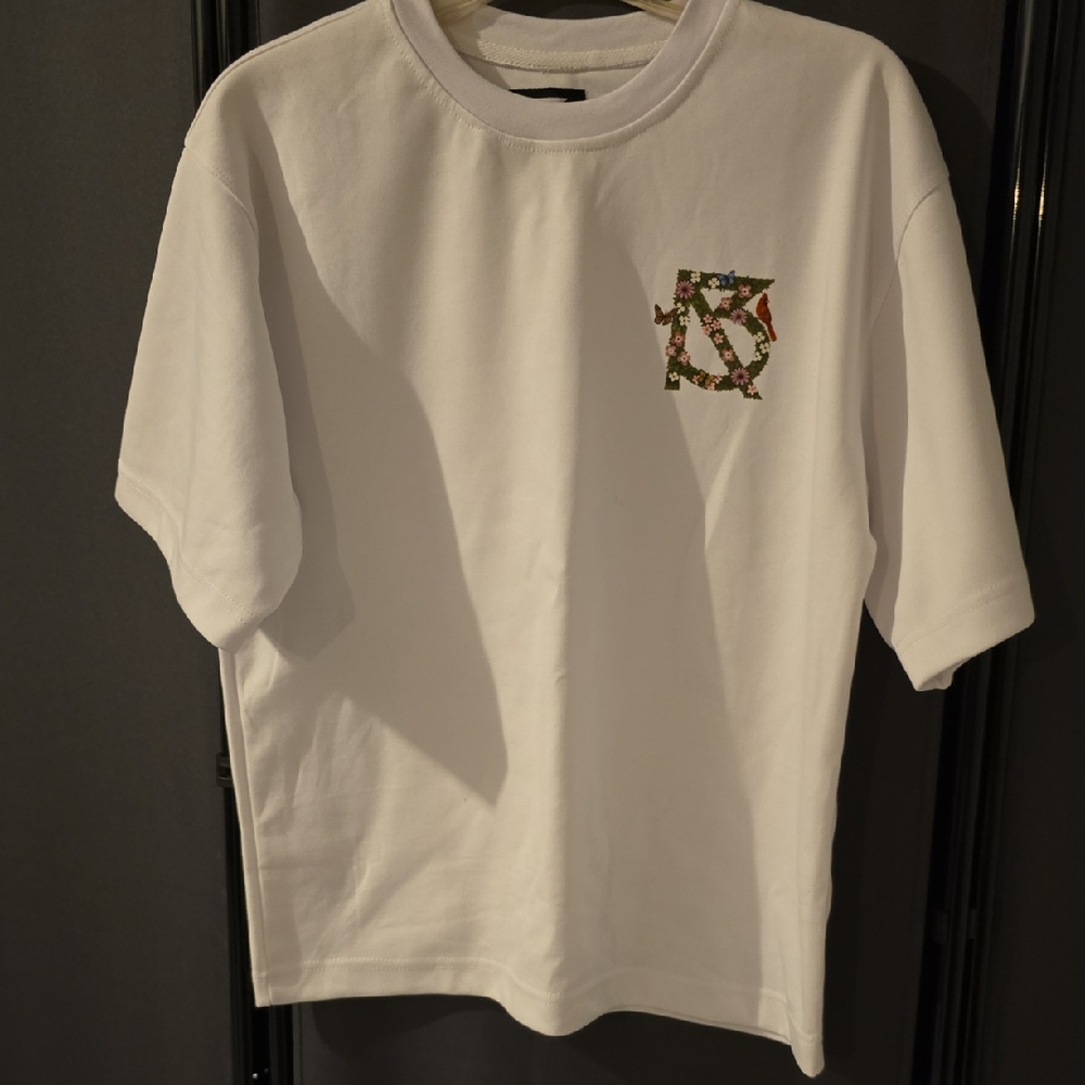 White Graphic Tee with Floral Design